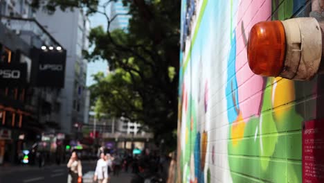 vibrant mural and bustling street in hong kong