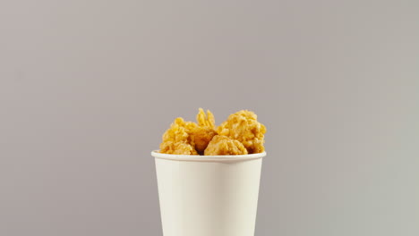 popcorn in a paper cup