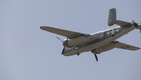 war plane flying over field