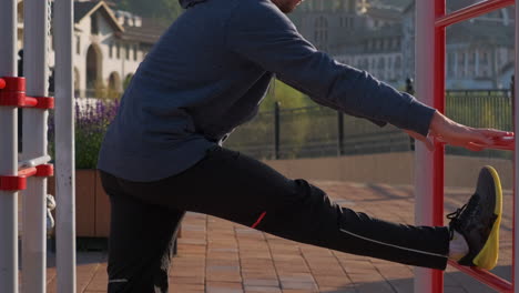 man stretching outdoors