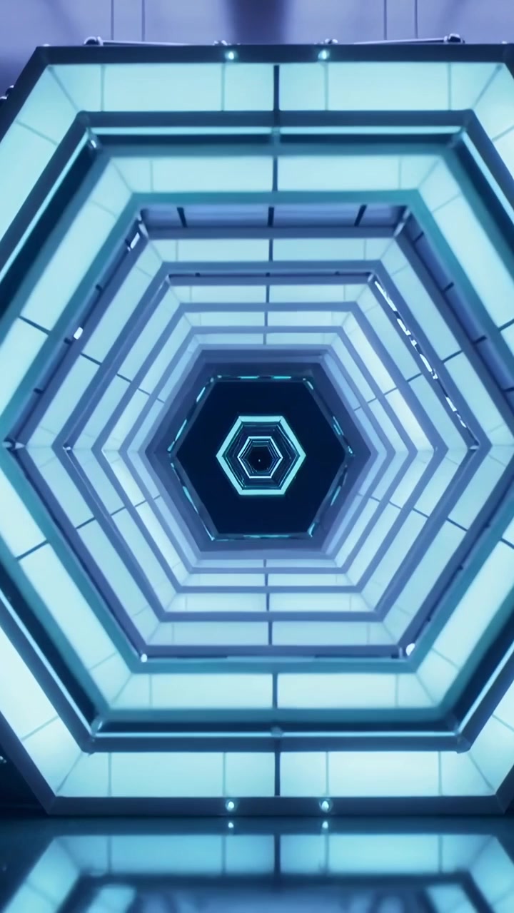 Vertical video: Lighting pulsing, hexagon rings moving inward in studio, LED grid mirroring