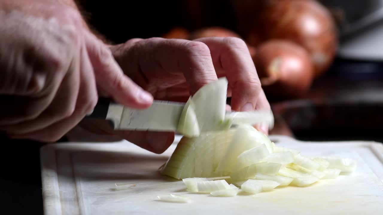 Chopping an onion, close shot