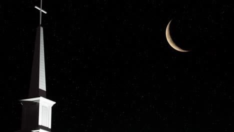 the cross in the church at night and the crescent moon in the background