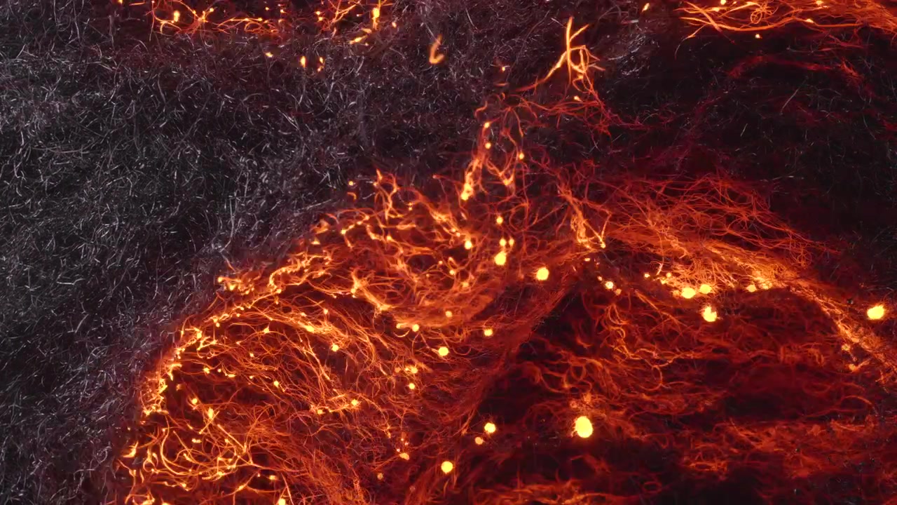Feuer breitet sich durch die sich entzündende Stahlwolle aus und bildet sich wie Neuronenstränge im Gehirn.