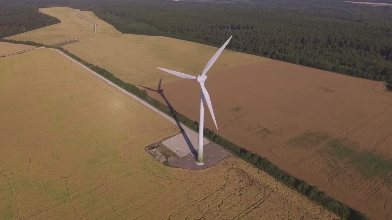 Wind Farm In Agricultural Fields On A Sunny Summer Day. Aerial Arc Right