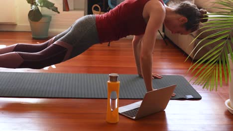 caucasian woman doing sport at home