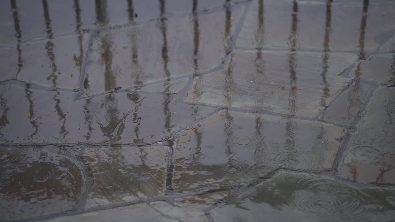 Rainfall on a stone tile floor