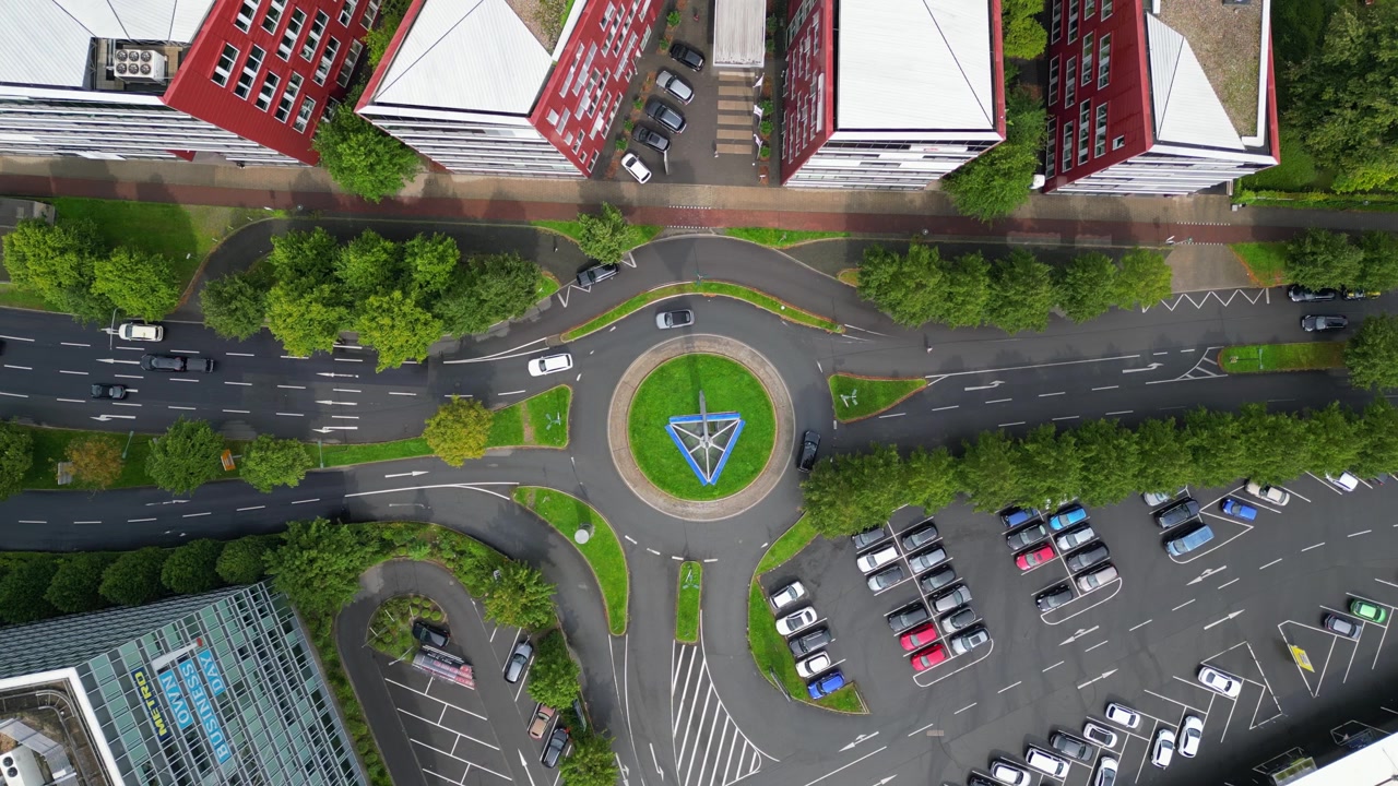 Urban green city roundabout traffic, Dusseldorf, Overhead aerial view