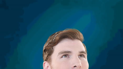 interested man looking up and looking around, on blue striped background