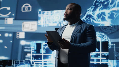 young black technician reviews data visualization and neural networks platforms