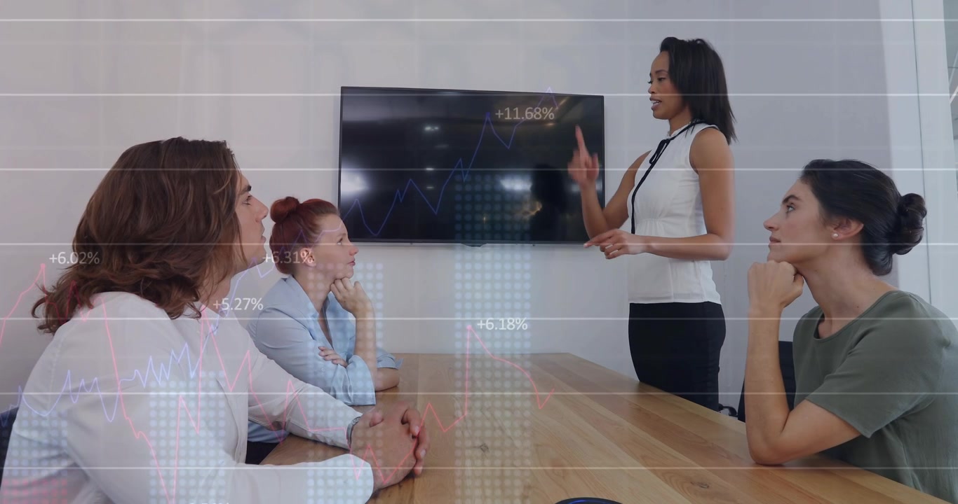 Business Professionals Discussing Data in a Modern Office Meeting