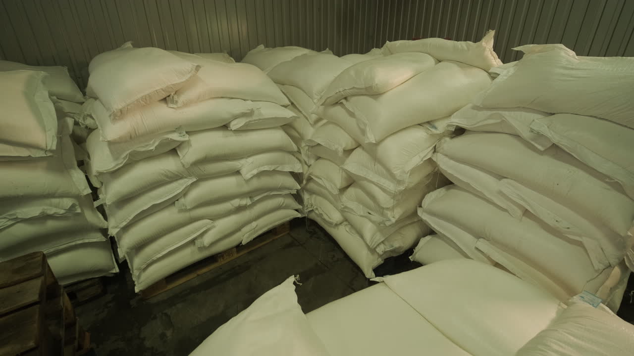 Stacked Bags of Grain in a Warehouse