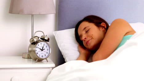 woman waking up and realising she is late