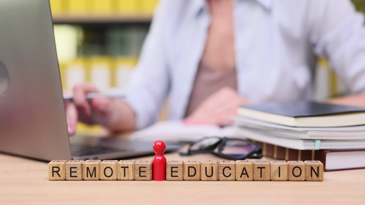 Remote Education Setup with Laptop and Wooden Blocks