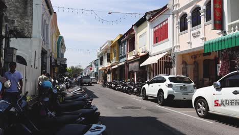 motorcyclist navigating through a busy street