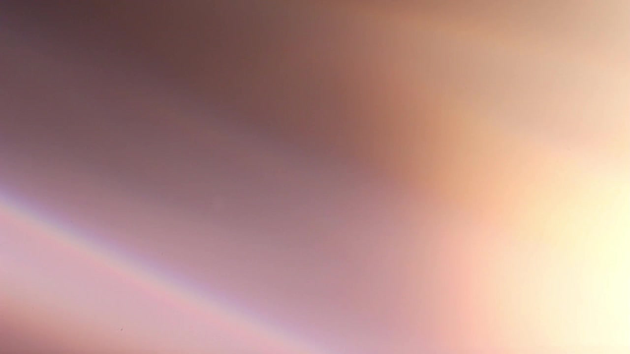 Dynamic Light Leak and Lens Flare Transition with Rainbow Colors