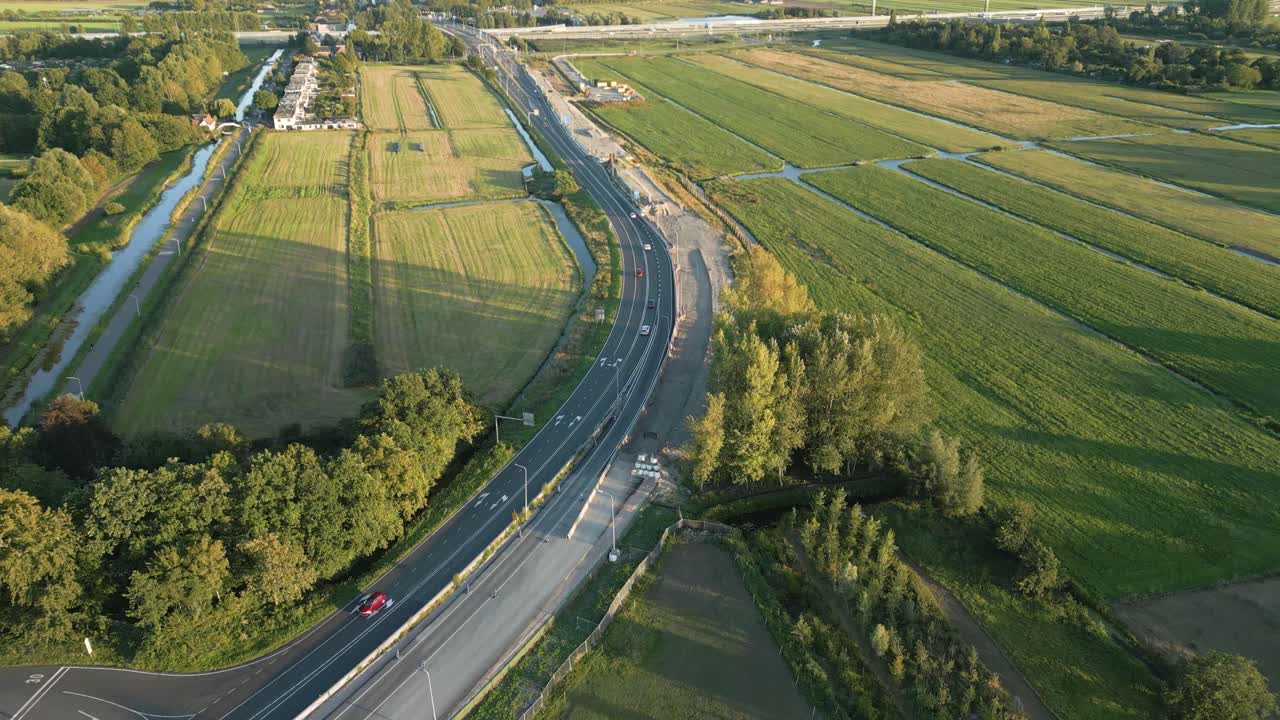 High drone shot showing new highway development in Leiden, Netherlands, connecting the city to the main road network