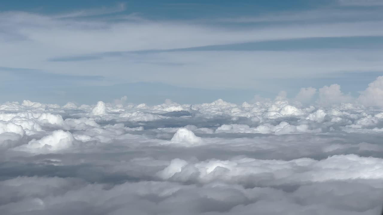 Observing the Clouds from an Airplane Window - POV