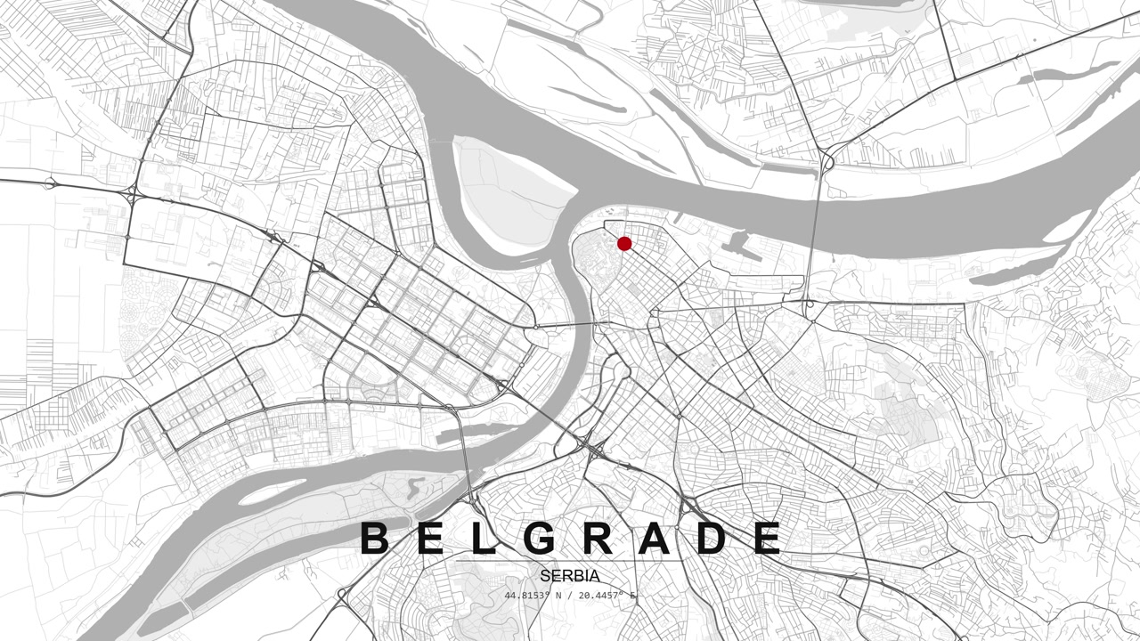 Monochrome map of Belgrade, Serbia showing river confluence, street grid and road network with a red location pin marking a point in the city.