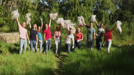 mid adults volunteering during river clean-up day