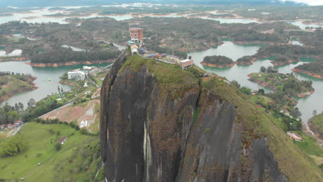 the rock of guatapé or el peñón de guatapé - tourist site of colombia - aerial drone shot