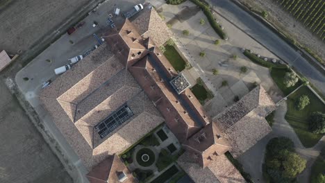 château angelus winery in saint-emilion, france. aerial top-down descending