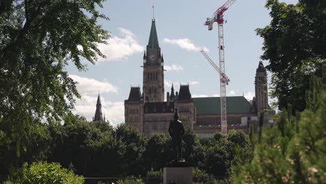 view of the parliament of canada, centre block, from major's hill park in ottawa - 4k slow motion