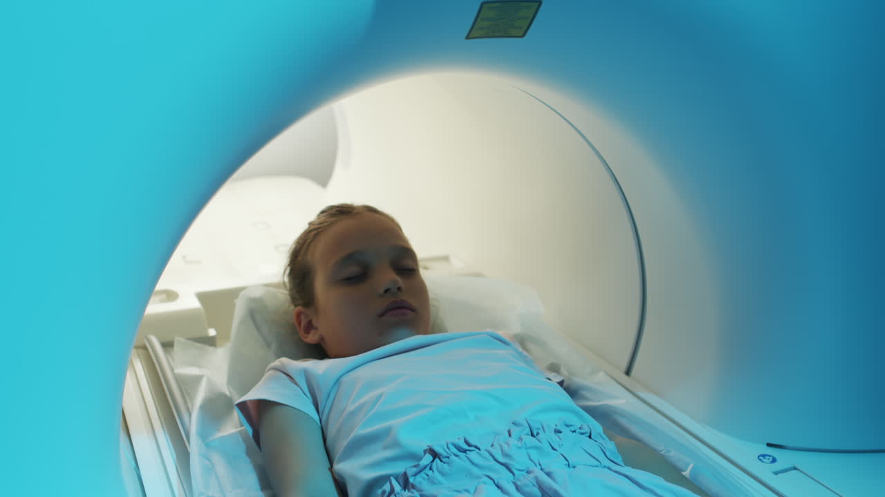 Girl Getting into MRI Scanning Tube