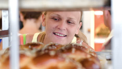 Woman-looking-at-bread-in-the-shop