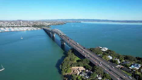 aerial view of auckland harbor bridge in auckland, new zealand - drone shot