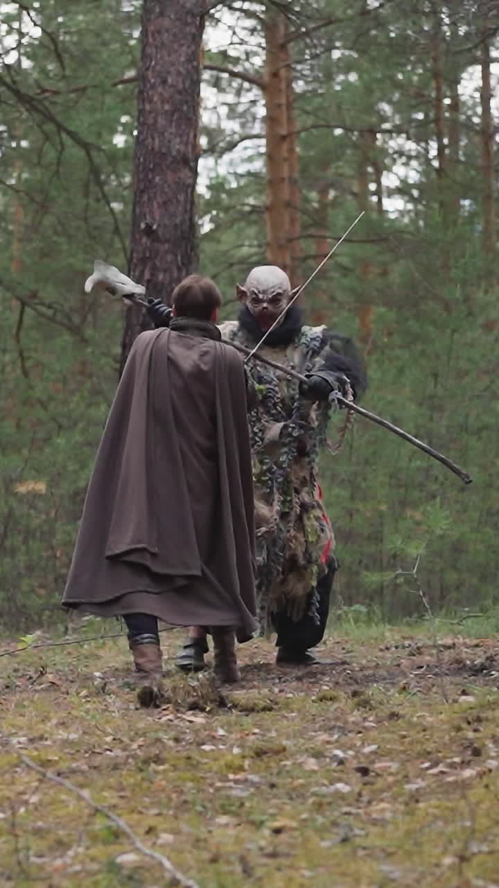 caballero lucha contra un monstruo y cae al suelo, juego de rol