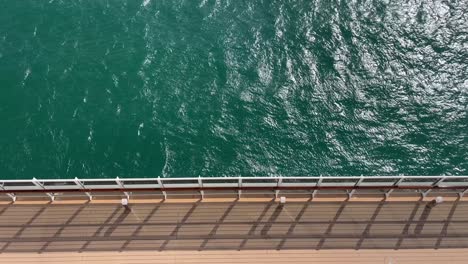 top down view of ocean sea from a cruise boat with sunshine