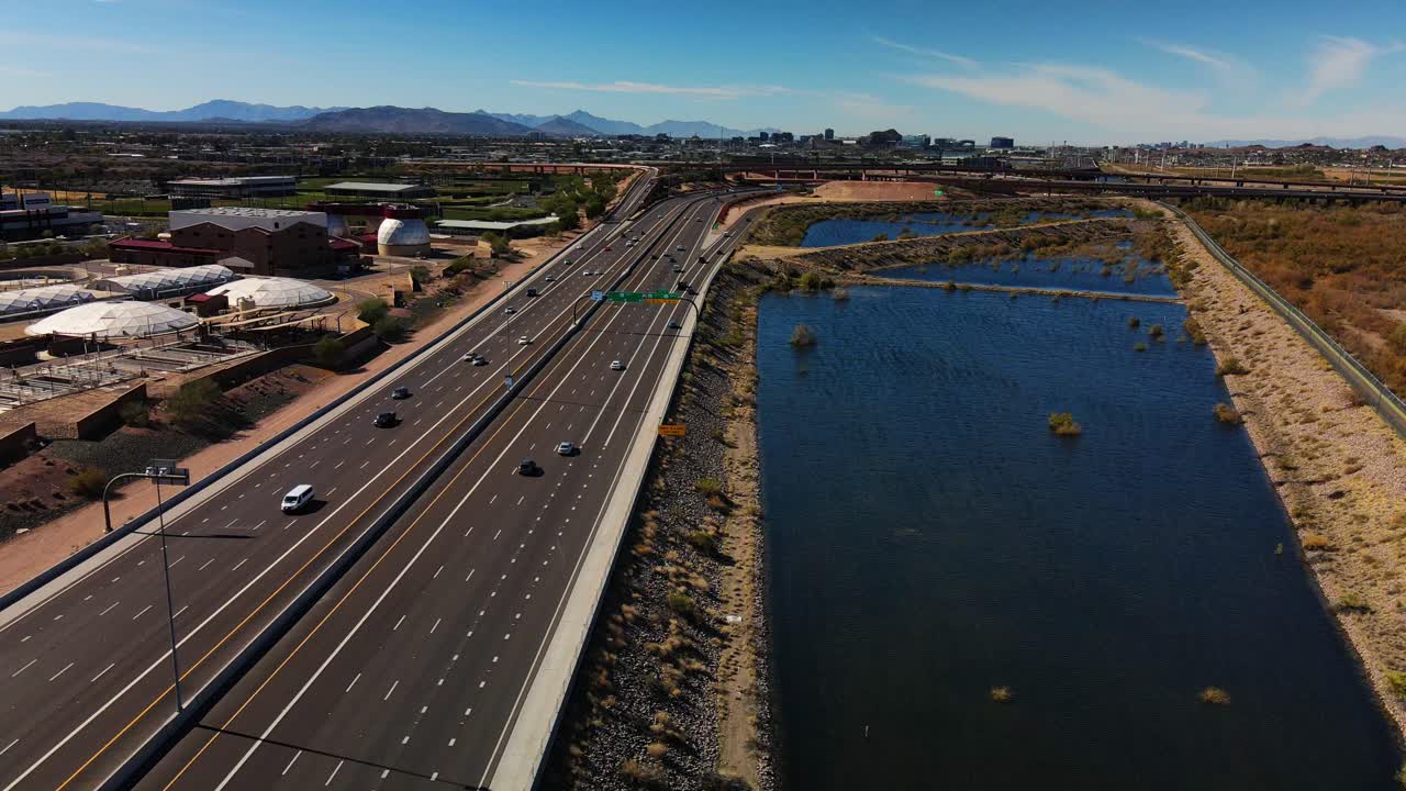 Loop 202 Freeway Rotation with Tempe Arizona Skyline by Salt River