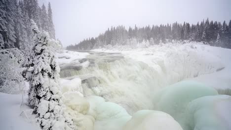 Slow-motion-of-Tannforsen-Waterfall-in-winter