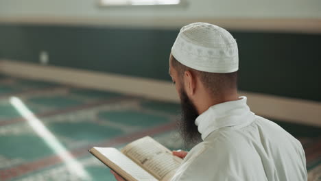 Islamic-man,-kiss-quran-and-mosque-for-faith