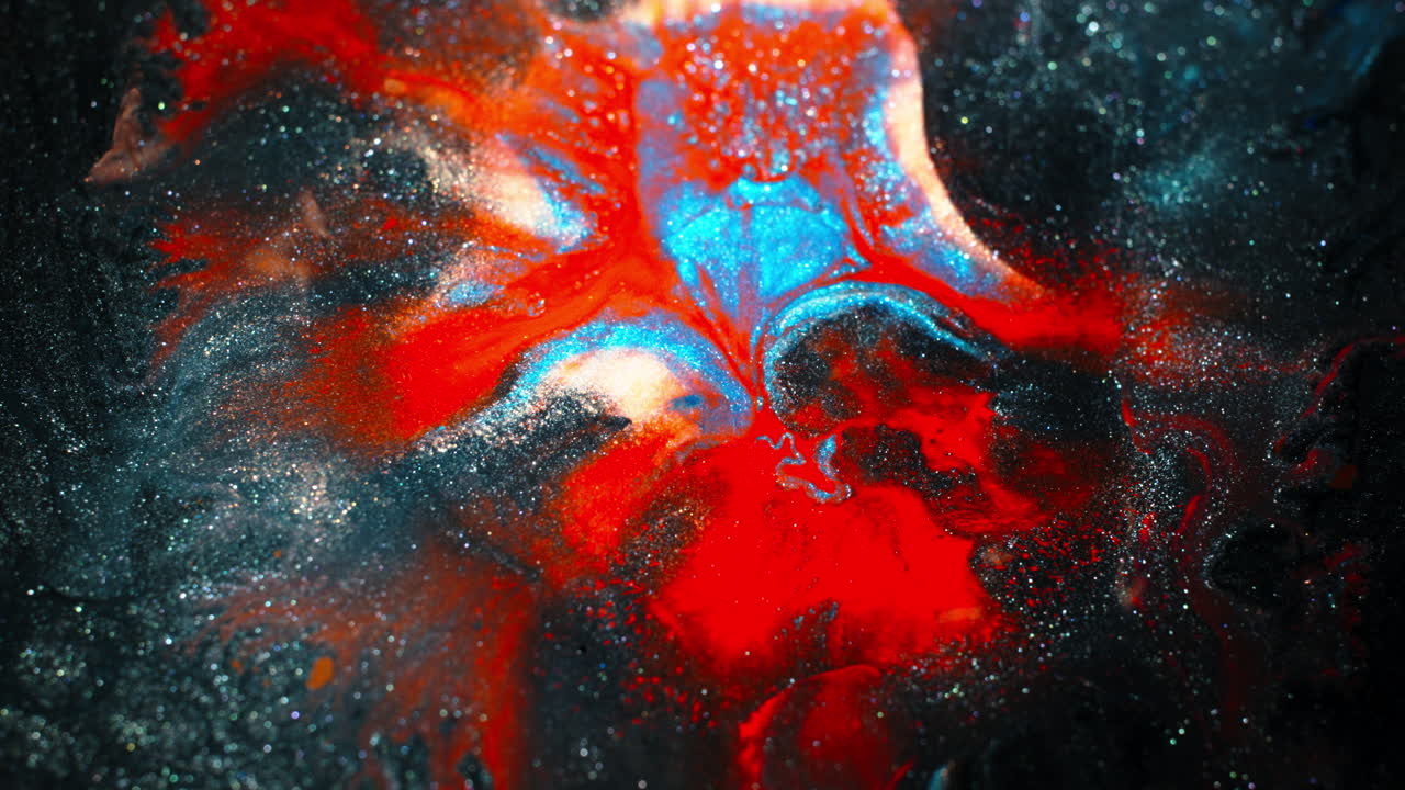 Vibrant colors mixing in abstract macro shot, creating a dynamic pattern