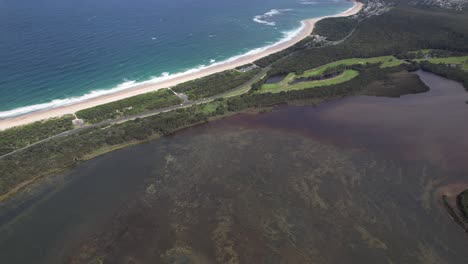 coastal landscape with lake and beach