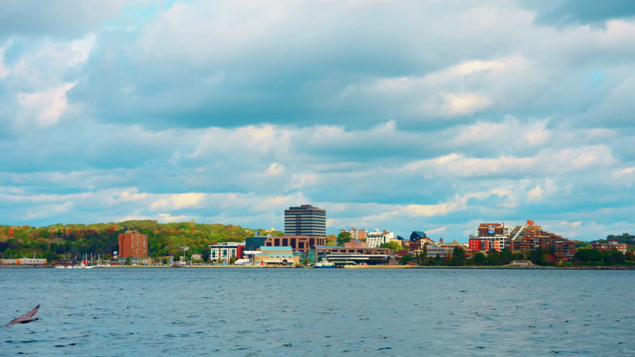 Panoramic view of the harbor district in Halifax, Nova Scotia, Canada. View of the colorful benches overlooking the ocean.