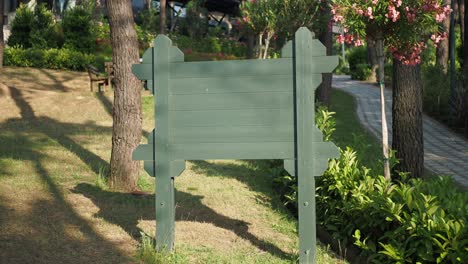 wooden sign in a park