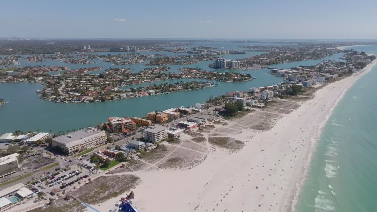 Sunny aerial drone view of Treasure Island Beach and condos in Florida