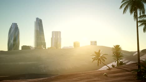 city skyscrapes in desert at sunset