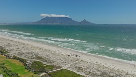 drone shot of a kitesurf event at blouberg with cape town in the background