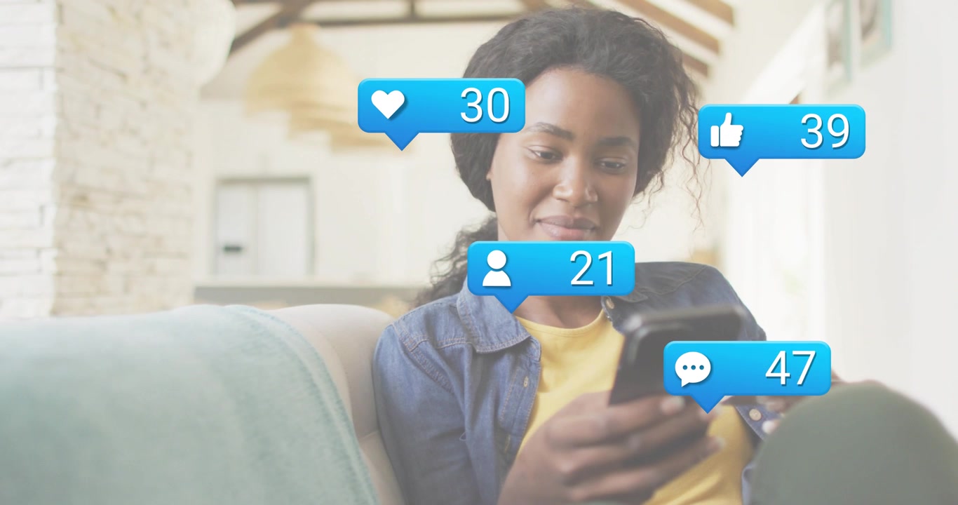 Woman tapping smartphone and monitoring rising social notification bubbles for engagement growth