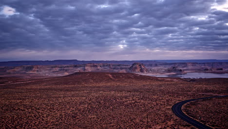 a captivating drone shot unveiling the vast, surreal desert and red rock formations near lake powell.