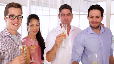 Gleeful-designers-celebrating-with-champagne-