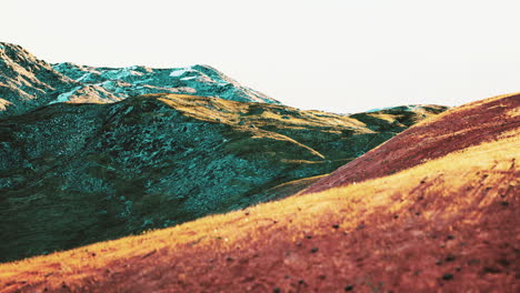 amazing scenery of colored mountain and sky at background in sunset