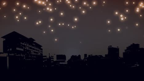 Estrellas-Brillantes-Cayendo-Contra-El-Paisaje-Urbano-Por-La-Noche