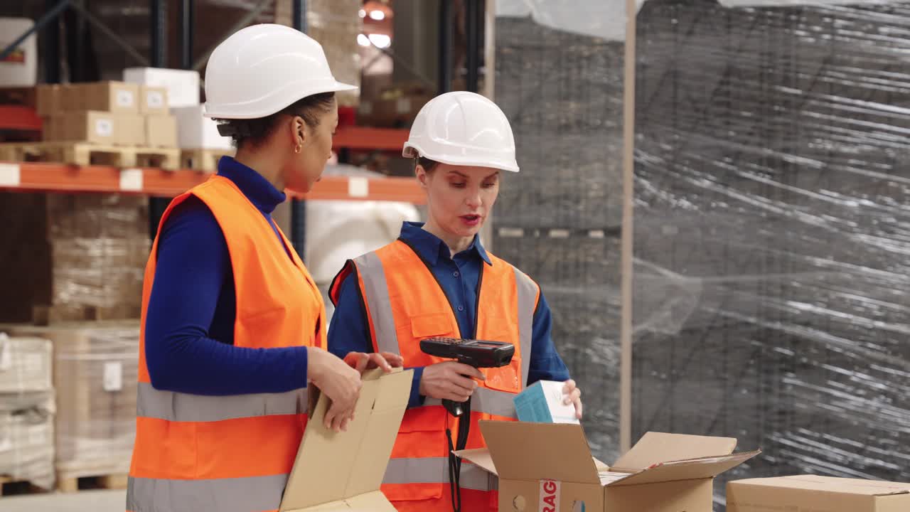 Warehouse Workers Managing Inventory and Scanning Packages