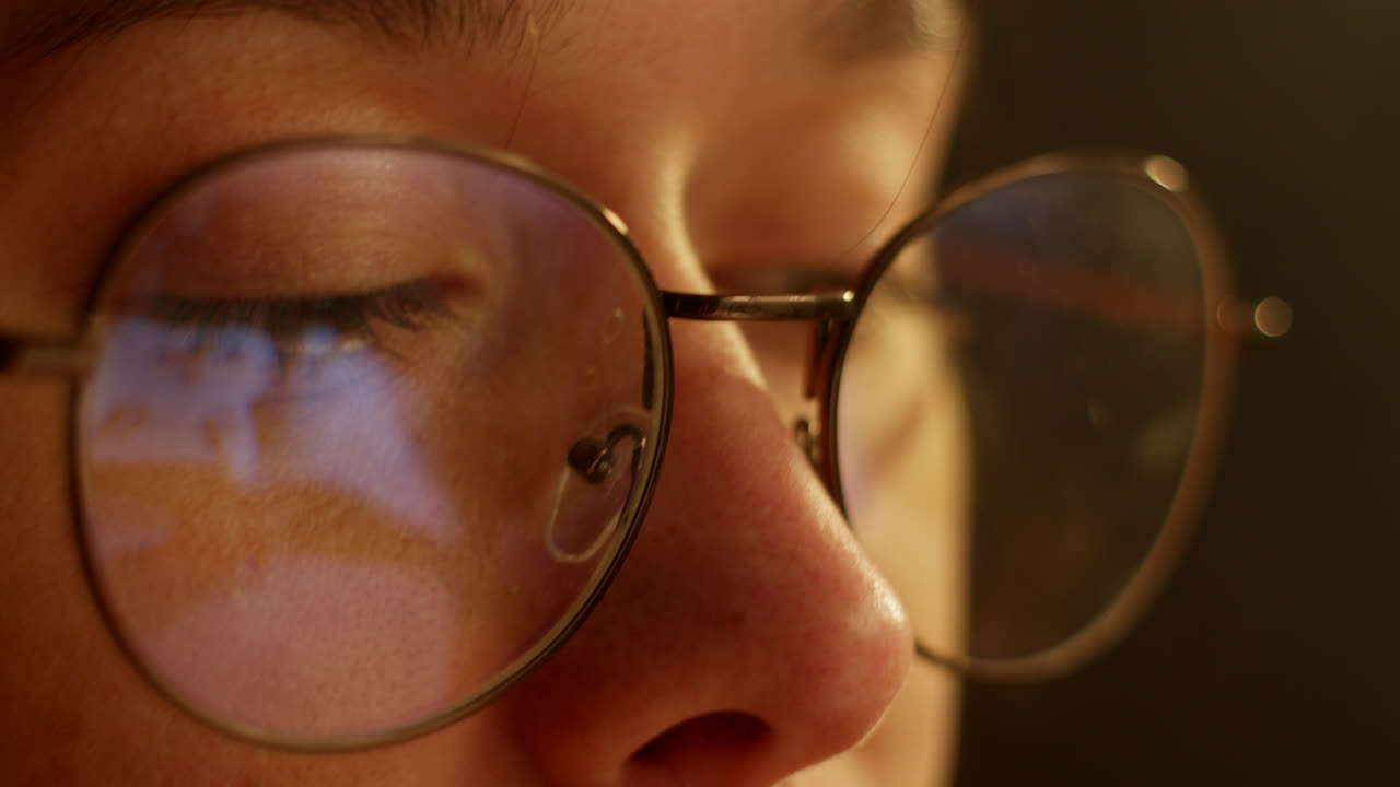 Person Wearing Glasses, Close-up View