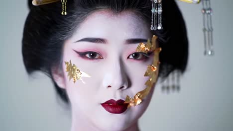traditional makeup transformation showcased in cultural artistry display